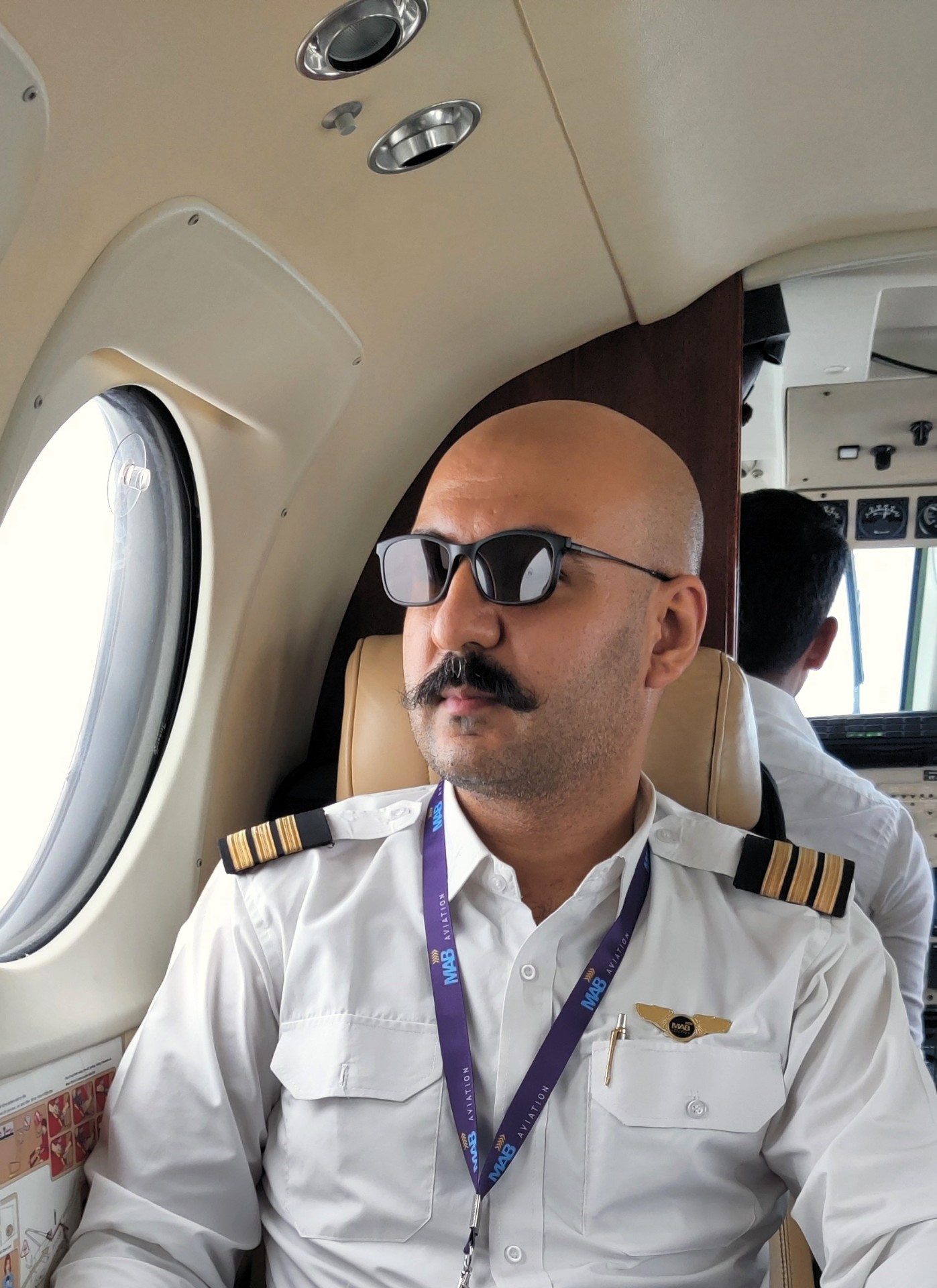 Capt. Nitish — cockpit portrait